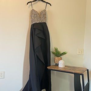 Black pencil gown w/ side train. Empire cut beaded bodice in perfect condition!